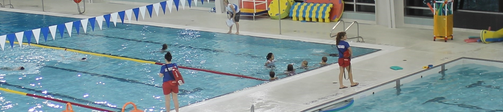 people swimming in pool